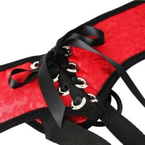made of plush red lace fabric. Fourway adjustable straps for up to 60 inch hips. Perfectly placed pocket that could hold a bullet vibrator (Not included) for clitoral stimulation. Accommodates dildos with flared base; includes 3 interchangeable rubber O-rings (1.5 inch