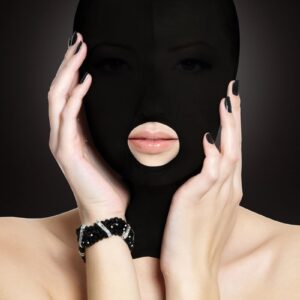 This comfortable Submission mask is designed to stretch completely over the head and closes easily at the back with a zipper. The fabric allows just a hint of light in while impairing vision and awakening  other senses. The shiny hood can be worn by him or her