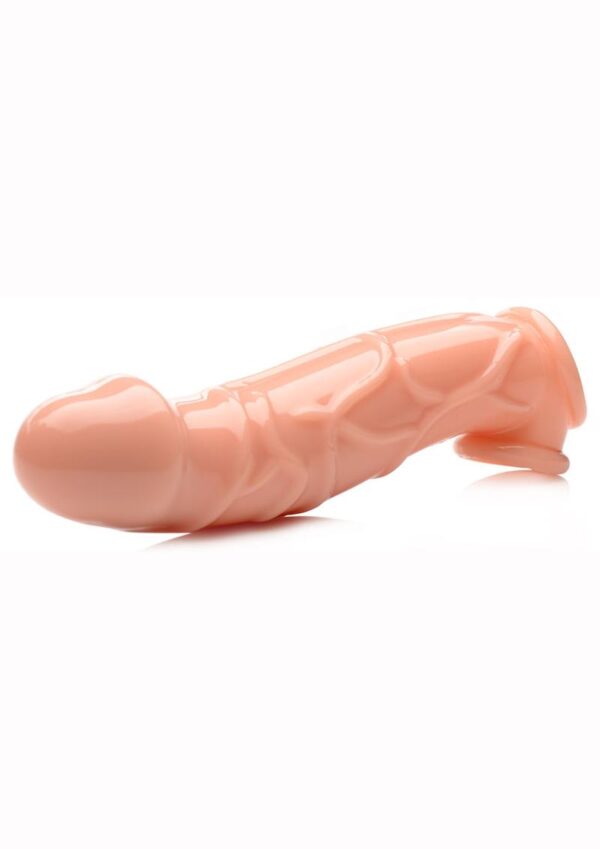 This extender sleeve gives you two whole inches of solid penis to plow into your partner! The realistic texture