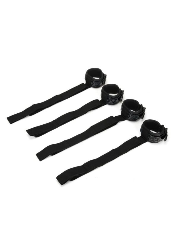 Turn your bed into the ultimate destination for bondage play. Strap your lucky submissive in for an unforgettable night of kinky bondage play with the Diamond Bed Ties set that includes wrist and ankle cuffs that will comfortably keep their limbs deliciously spread for enjoyment. The padded cuffs buckle on comfortably and securely to allow you to indulge in the pleasure of complete submission.