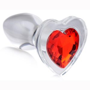 Decorate your derriere with a sparkling red heart! Display your love between your cheeks with these see-through glass butt plugs - the solid mass and smooth surface fills your backdoor with a satisfyingly hard sensation! Perfect for warming up or as a dedicated anal pleasure toy.Smooth and tapered for easy entry without discomfort and compatible with most lubricants so you can play your way. Heat or chill this heart shaped anal dream for an an extra layer of pleasure!This see through glass plug is naturally body safe and hypoallergenic for those with sensitive bodies. The smooth texture also makes these plugs easy to clean with warm water and mild soap - be sure to clean before and after use!Perfect for warming up your backdoor for rougher play or simply as a treat for the eyes for your partner while they enjoy the rest of your body! This medium sized plug is perfect for intermediate anal players or for beginners seeking to stretch their hole to the next level. Insert this heart shaped Booty Spark and make that booty sparkle!Measurements: Overall length 2.8 inches