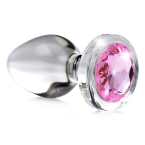 Adorn your derriere with a dazzling gem! These glassy Booty Sparks anal plugs are crystal clear and super smooth to provide a solid texture for your backdoor. Perfect for stretching your anal limits and filling your backdoor to capacity - the rigid body and super smooth surface press firmly against your walls for an incredibly satisfying squeeze! Enhance your ass with a bright pink gem to entice your lover and prep your booty for some rougher play. Simply lube up and  to make that booty sparkle! The glass material is naturally hygienic and body-safe so you can play worry-free. Resistant to odors and easy to clean before and after use