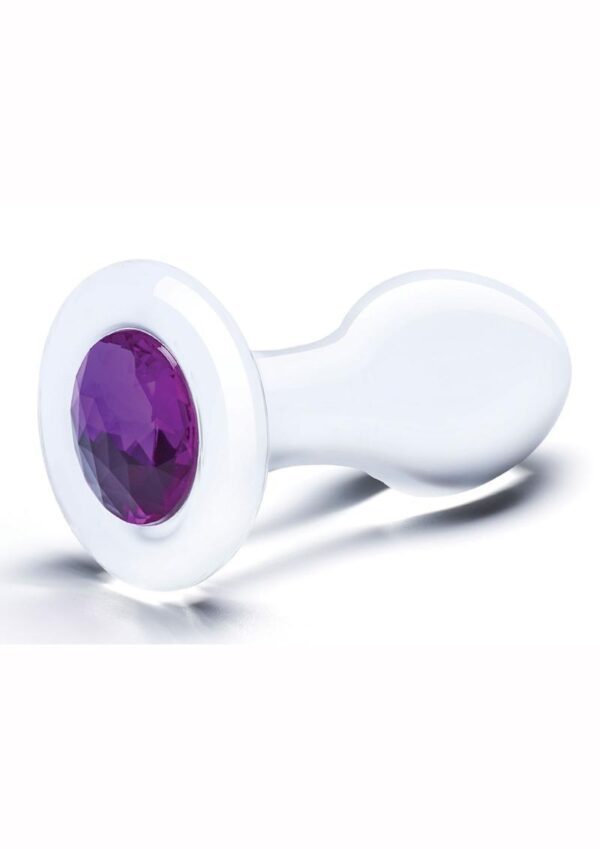 Dress up your backdoor play with a beginner-friendly butt plug that is adorned with a beautiful gem at the base. Your bum will look stunning with a plug that looks as good as it feels. Choose between a translucent clear shade or a darker hue to match any mood.