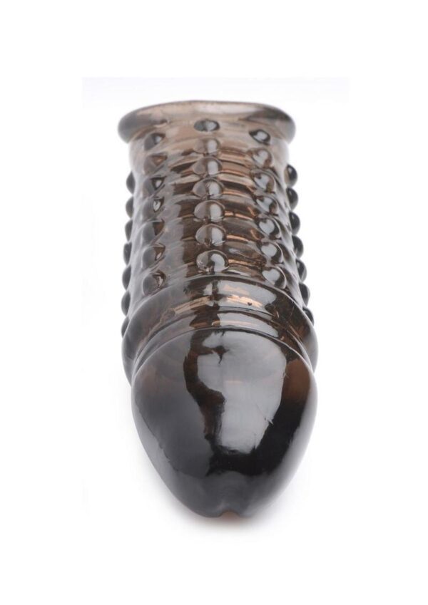 and along your shaft for a slick and pleasurable sensation.The 5.5 inch hollow inside of this sleeve fits most cock sizes - the soft TPR material hugs and holds most shafts without discomfort. This sleeve is held in place via the stretchy ball strap for added security and less slippage while you thrust. The tip of this sleeve is semi-solid