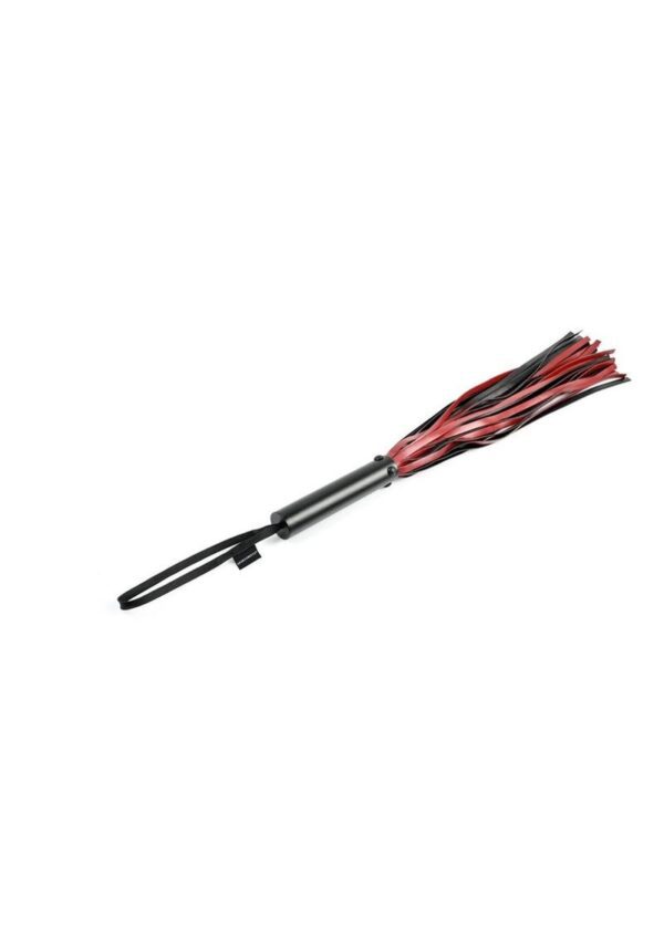 flexible strand of the Saffron Classic Flogger can whisper across their body or cross it with a biting snap.