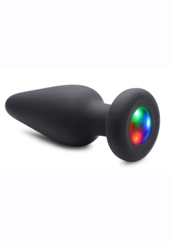 Light up the night with this light-up anal plug! Have some fun with your booty play and give your partner a light-show at the same time. This silicone anal plug has an LED light that shines red