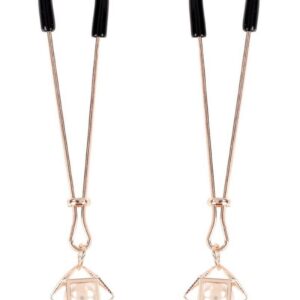 Push all your dom`s buttons for the perfect punishment. The adjustable Brat Pearl Nipple Clips offer varied sensations ranging from soft squeezes to pinching pleasures. Adorn your nipples with these beautiful rose gold clips dripping with faux pearl and get ready to turn up the heat.andnbsp;               Rubber-tipped nipple clamps with tension adjustmentsandnbsp;                   Pearl accents for tugging and pullingandnbsp;