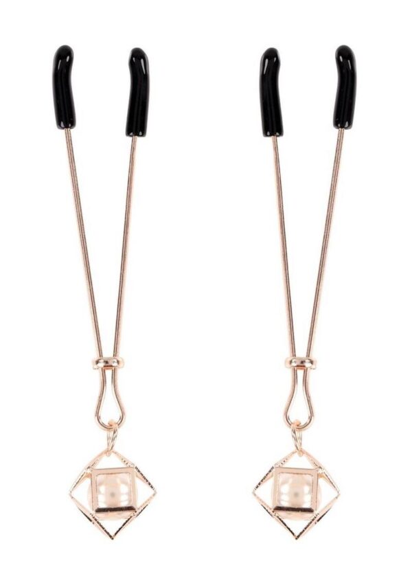 Push all your dom`s buttons for the perfect punishment. The adjustable Brat Pearl Nipple Clips offer varied sensations ranging from soft squeezes to pinching pleasures. Adorn your nipples with these beautiful rose gold clips dripping with faux pearl and get ready to turn up the heat.andnbsp;               Rubber-tipped nipple clamps with tension adjustmentsandnbsp;                   Pearl accents for tugging and pullingandnbsp;