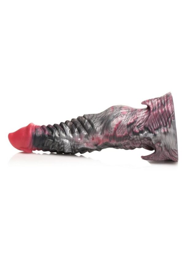 This mythical shaft is none other than the King of the Underworld`s masterpiece. Hades himself has come to claim you with a black and red rod that is designed with devilish details. The tapered tip helps it slip inside but then the countless grooves and ridges will delight you and send you well over the edge of pleasure! The wide base provides powerful suction so you can go hands-free by placing it on any flat surface to keep it in place. You can also combine it with a compatible strapon harness for pegging play! Made out of premium