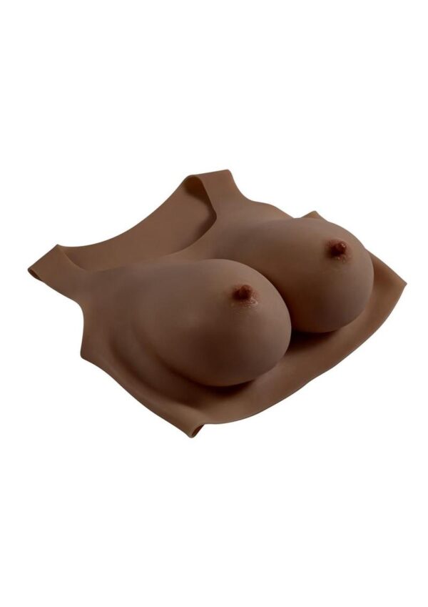 designed with a natural shape and sway that looks great under clothing. The easy-to-put-on vest design makes these E-cup enhancements super comfortable for a confident experience. Specs:  Made from phthalate andamp; latex-free silicone Vest stretches to fit most  Measurements:  Designed for people 5andrsquo;4andrdquo; andndash; 6andrdquo; tall Shoulder width: 13.4andrdquo; Arm girth: 32.3andrdquo; Upper chest circumference: 37andrdquo; Lower chest circumference: 30.7andrdquo; Full length: 11.8andrdquo;