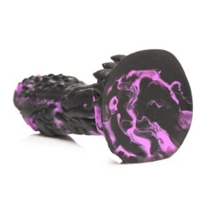 grooves and spikes on it. The edge of the corona is rimmed with spiked nubs and is wider at the top then the middle. The wide base provides powerful suction so you can go hands-free by placing it on any flat surface to keep it in place. You can also combine it with a compatible strapon harness for pegging play! Made out of premium