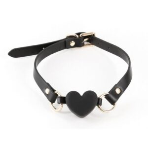 Tease and tantalize your submissive lover with Fetish and Fashion`s collection of seductive ball gags. Silicone mouthpiece. Strap is made from synthetic materials (PU) and nickel-free hardware and features an adjustable buckle closure. Fetish andamp; Fashion Ball Gags are available in a variety of shapes and sizes. Katherine is a breathable ball gag - this product does not create a seal on the lips.  Air can pass through the V area on the heart.  Waterproof Rating - IPX8.