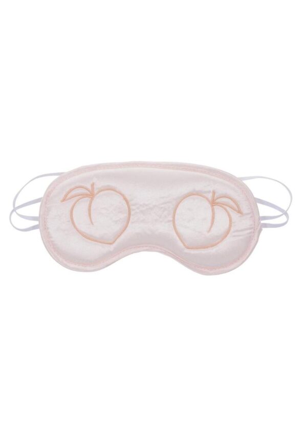 Get ready to dive into a world of sensory delight with the Peaches n CreaMe Blindfold! Slip into the sweet surrender of mystery and let your imagination run wild with this flirty and playful accessory. The luscious peach-colored satin is as smooth as a summer breeze against your skin