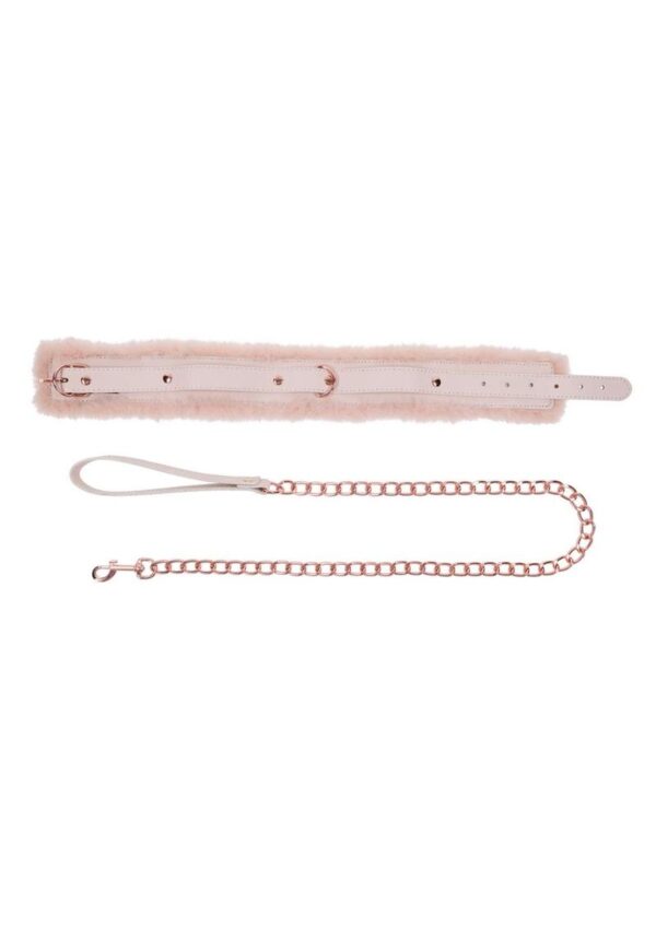 Unleash your inner flirt and take your playtime to a whole new level with a luscious peach-colored faux fur-lined collar and matching leash. The soft