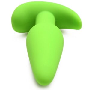 this plug is a little over 3 inches long and has a tapered tip for easy ion. The slim neck and flanged base keep it safely in place as you enjoy wearing it for play and pleasure! Enjoy 3 speeds and 7 patterns of powerful buzzing vibes in your derriere that can be controlled via the battery-operated remote! The glow-in-the-dark premium silicone toy responds to sunlight and indoor light so you can charge it before using it. Made out of phthalate-free
