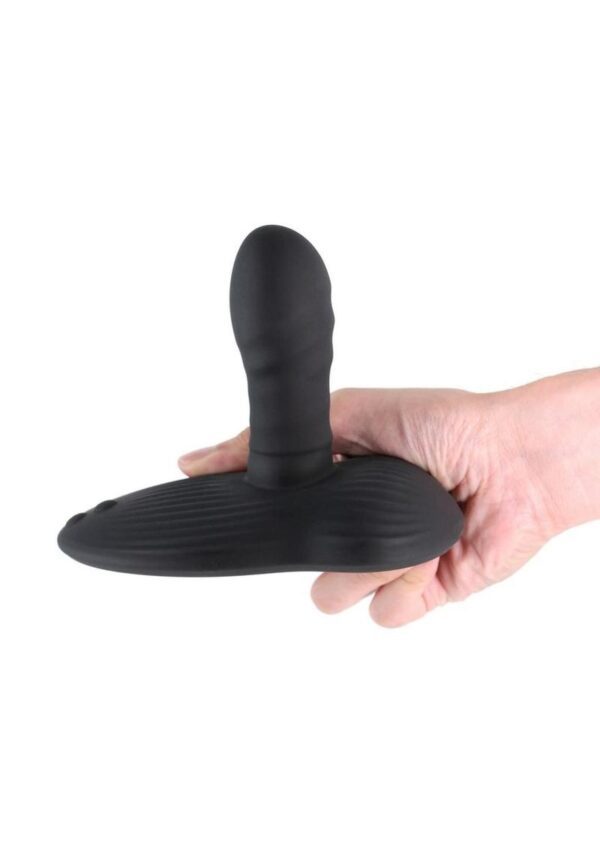 a vibrating pad and a suction feature to allow hands free use. Operable alone or via a downloadable APP and suitable for sitting or laying