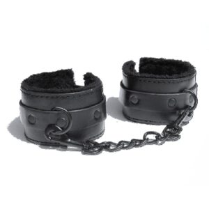 One pair of vegan leather and fur lined handcuffs   Adjustable buckle closure   Black hardware with dual clasps