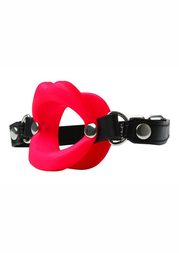 Create a sexy lipstick fantasy with the Silicone Lips open mouth gag   Wrap your lips around the gag and secure with the adjustable vegan leather strap with buckle closure