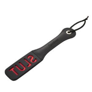 The Leather Slut Impression Paddle is made of high quality leather. The length of the paddle is 12 with a wrist loop for added stability. The paddle has the word SLUT cut out and with each stiff slap