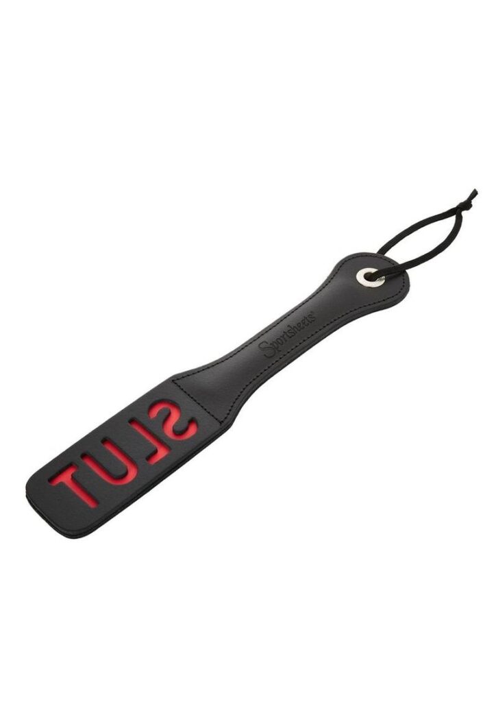 The Leather Slut Impression Paddle is made of high quality leather. The length of the paddle is 12 with a wrist loop for added stability. The paddle has the word SLUT cut out and with each stiff slap