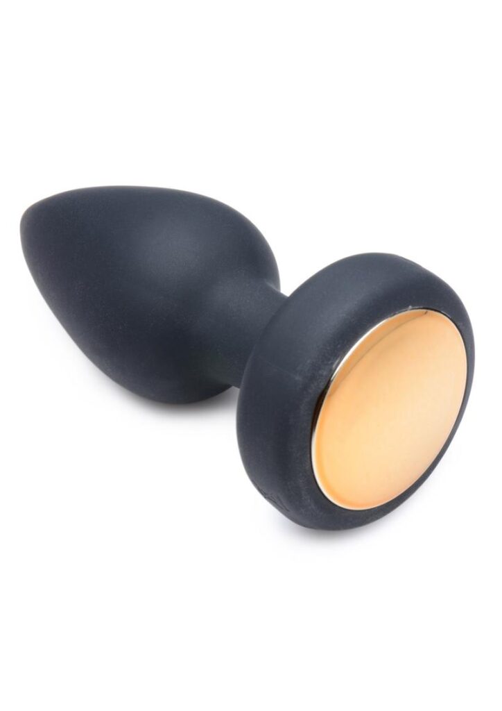 Put on a sexy backdoor light show! This petite plug nestles between your cheeks and buzzes your booty with 7 modes of powerful vibration. Meanwhile
