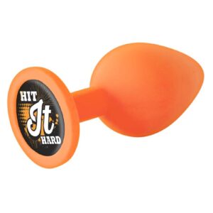 The Nines Booty Calls Butt Plug Orange Hit It Hard from Icon Brands. Made using body safe phthalate free materials Silicone. The plug with a message on base HIT IT Hard. 100% silicone. 100% fun. Only use a water based personal lubricant.