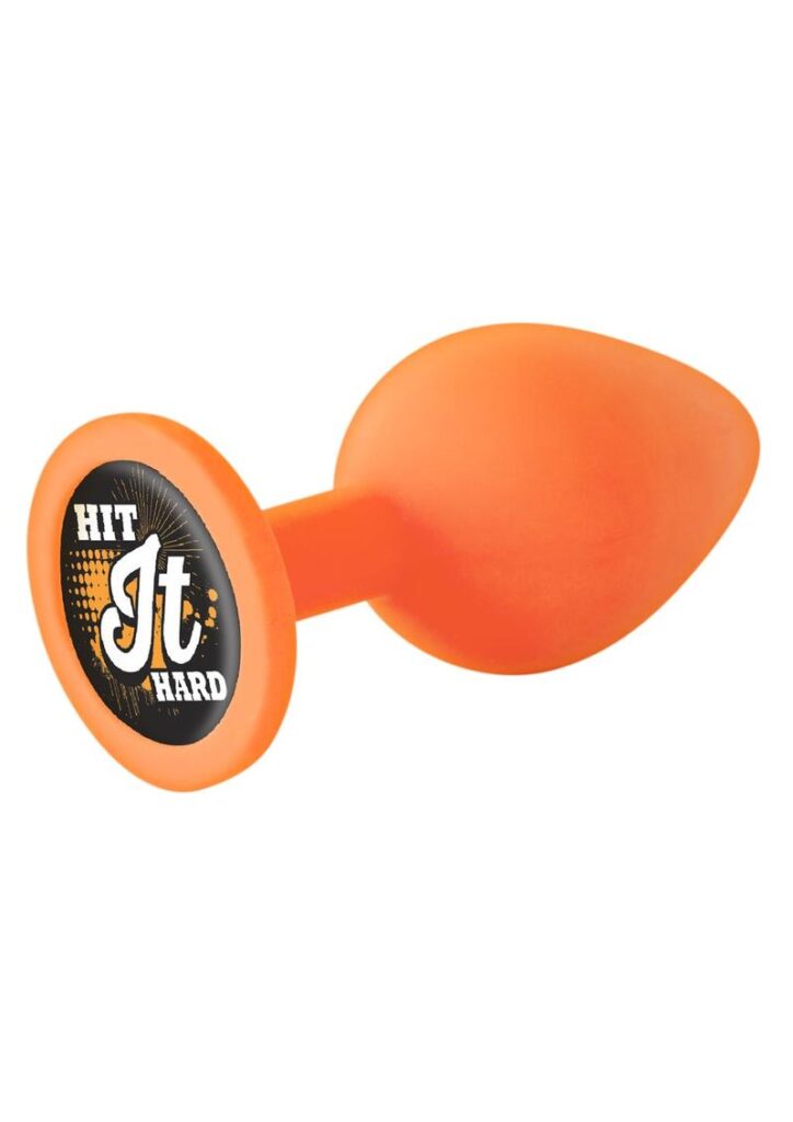 The Nines Booty Calls Butt Plug Orange Hit It Hard from Icon Brands. Made using body safe phthalate free materials Silicone. The plug with a message on base HIT IT Hard. 100% silicone. 100% fun. Only use a water based personal lubricant.