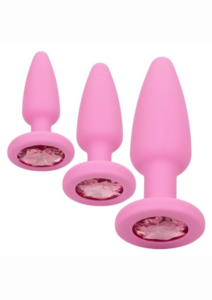 Give into your naughtiest fantasies and open yourself up to thrilling backdoor play with the First Timeandreg; Crystal Booty Kit. This glamorous kit includes a set of 3 graduated anal plugs with a gem base to let you safely and comfortably increase passionate anal stimulation. To enjoy everything the exhilarating world of anal play has to offer