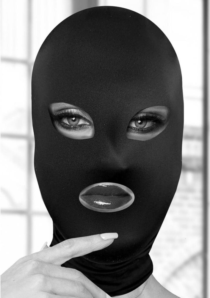 Keep your submissive incognito with this Subversion Mask. This comfortable open-mouth and eyes hood is designed to stretch completely over the head. The lightweight fabric makes breathing and hearing a snap and best of all
