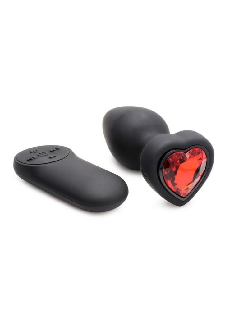 Bejewel your bottom with this Red Heart Gem Anal Plug! Show off your beautiful backdoor and feel the intense pleasure from 4 speeds and 7 patterns of rumbling vibration that wake up your P-spot and send tingles to your A-spot! Those hard-to-reach pleasure places are teased and tantalized with an easy-to- plug; the tapered tip helps you part your little brown star and