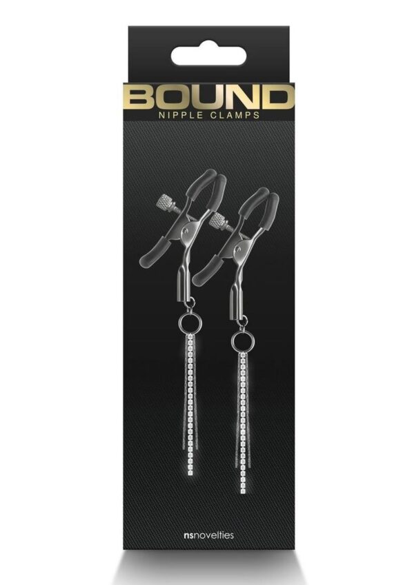 Bound`s clamps feature silicone tips for a better comfort and fit. Dangling chains and rhinestones.