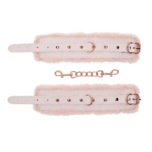 Indulge in a world of playful pleasure with our Peaches n CreaMe Faux Fur Cuffs! These handcuffs are not just an accessory; they`re a flirty invitation to elevate your intimate moments. Wrapped in the softest light peach-colored faux fur