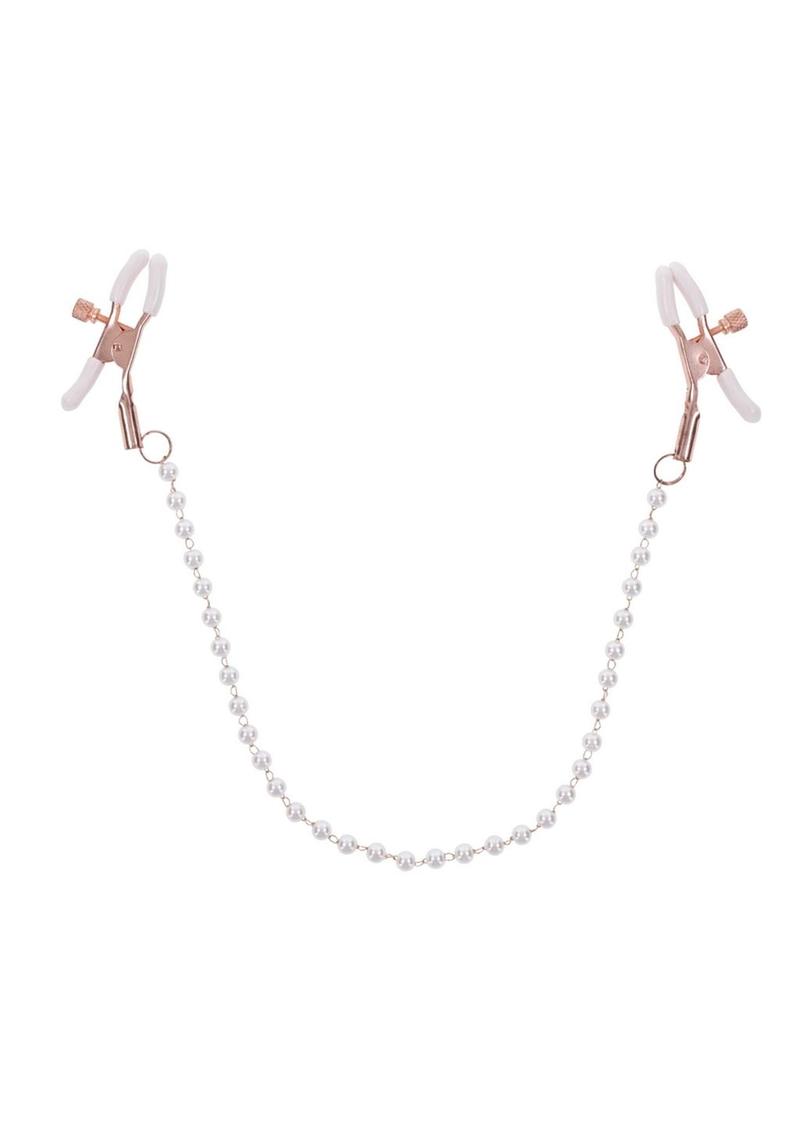 Take a tastefully tantalizing step into deeper sensations with the Peaches n` CreaMe Pearl Nipple Clamps. Explore delicious sensitivity right where you want it most with dual adjustable clamps in stunning rose gold with pearl accents. White rubberized tips add a playful pop of color to your play and keep the clamps from slipping as you tease and pull your lovers chain