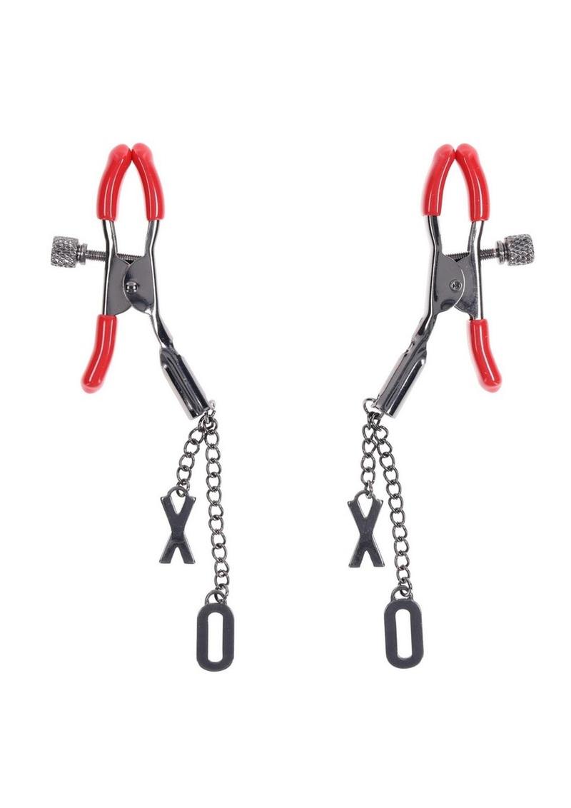 Indulge in a blend of pleasure and style with the Ex`s andamp; Oh`s Nipple Clamps. These elegant gunmetal clamps feature soft red rubber tips designed for a comfortable yet tantalizing experience. Perfect for beginners and beyond