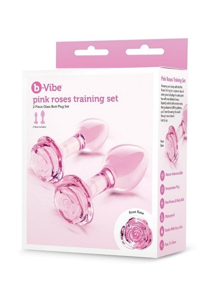 a dynamic duo of sleek glass butt plugs in a dusty pink hue with rose detailed bases. Expertly crafted with slender necks that graduate to fulfilling spheres