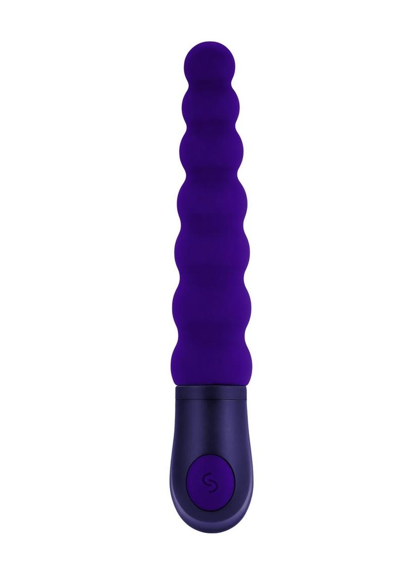 This slightly arched beaded vibrator has 3 squishy bulbs at its flexible top and 4 firm ones as they get larger in size toward the base