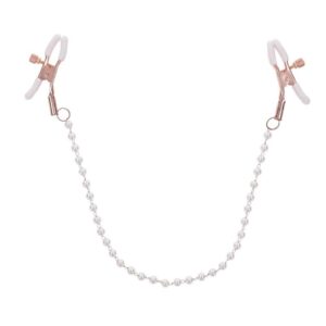 Take a tastefully tantalizing step into deeper sensations with the Peaches n` CreaMe Pearl Nipple Clamps. Explore delicious sensitivity right where you want it most with dual adjustable clamps in stunning rose gold with pearl accents. White rubberized tips add a playful pop of color to your play and keep the clamps from slipping as you tease and pull your lovers chain